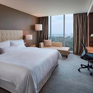 Habitación con Cama King en Pisos Superiores